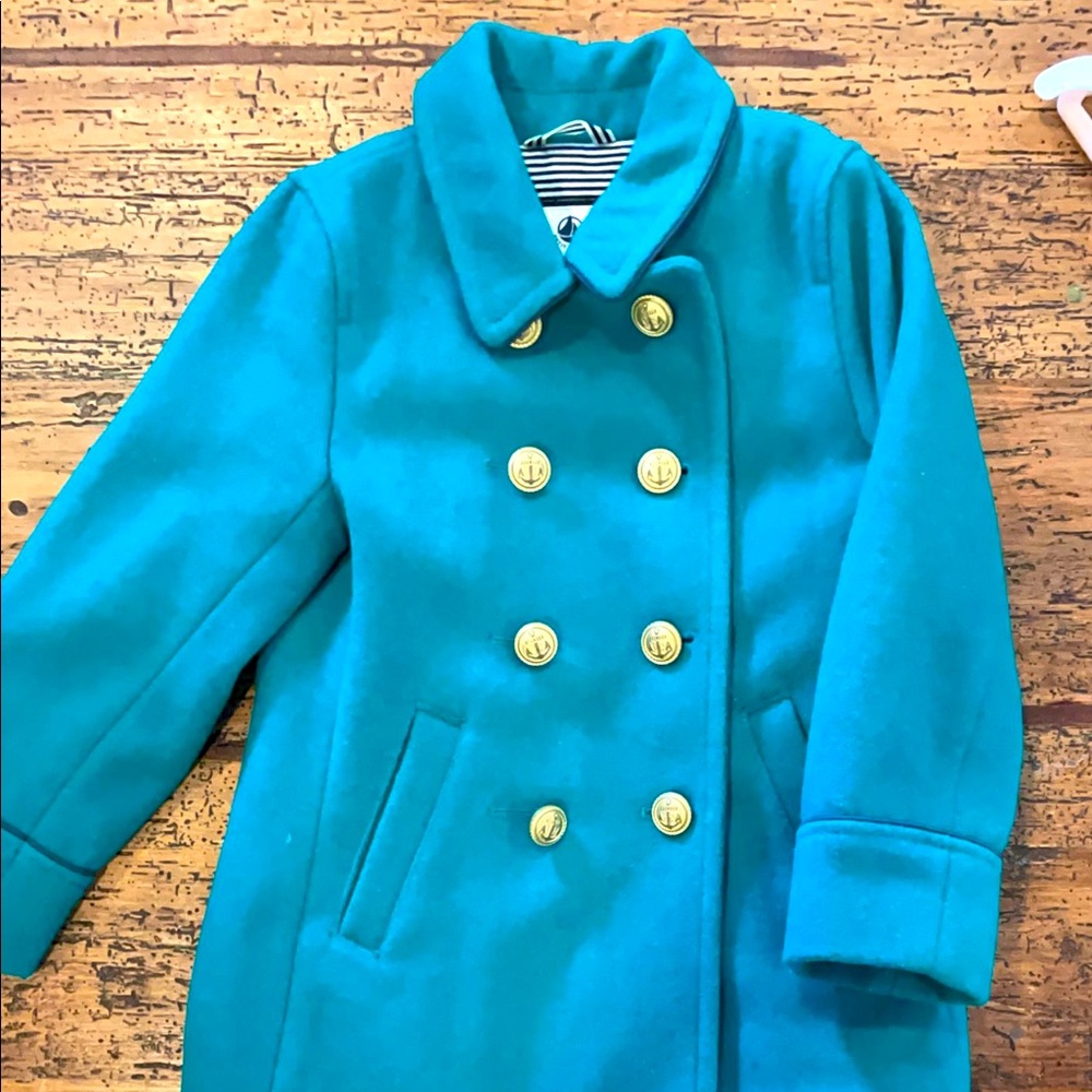 Petit Bateu coat is emerald green new without tags
